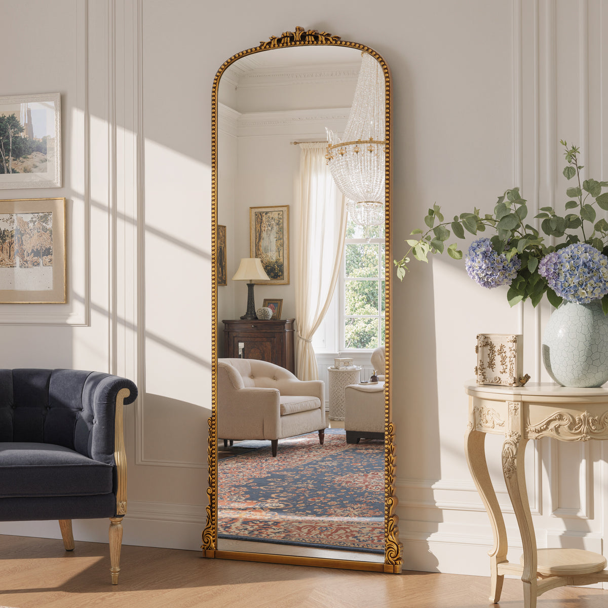 Aurelia antique gold ornate arched mirror shown at an angle