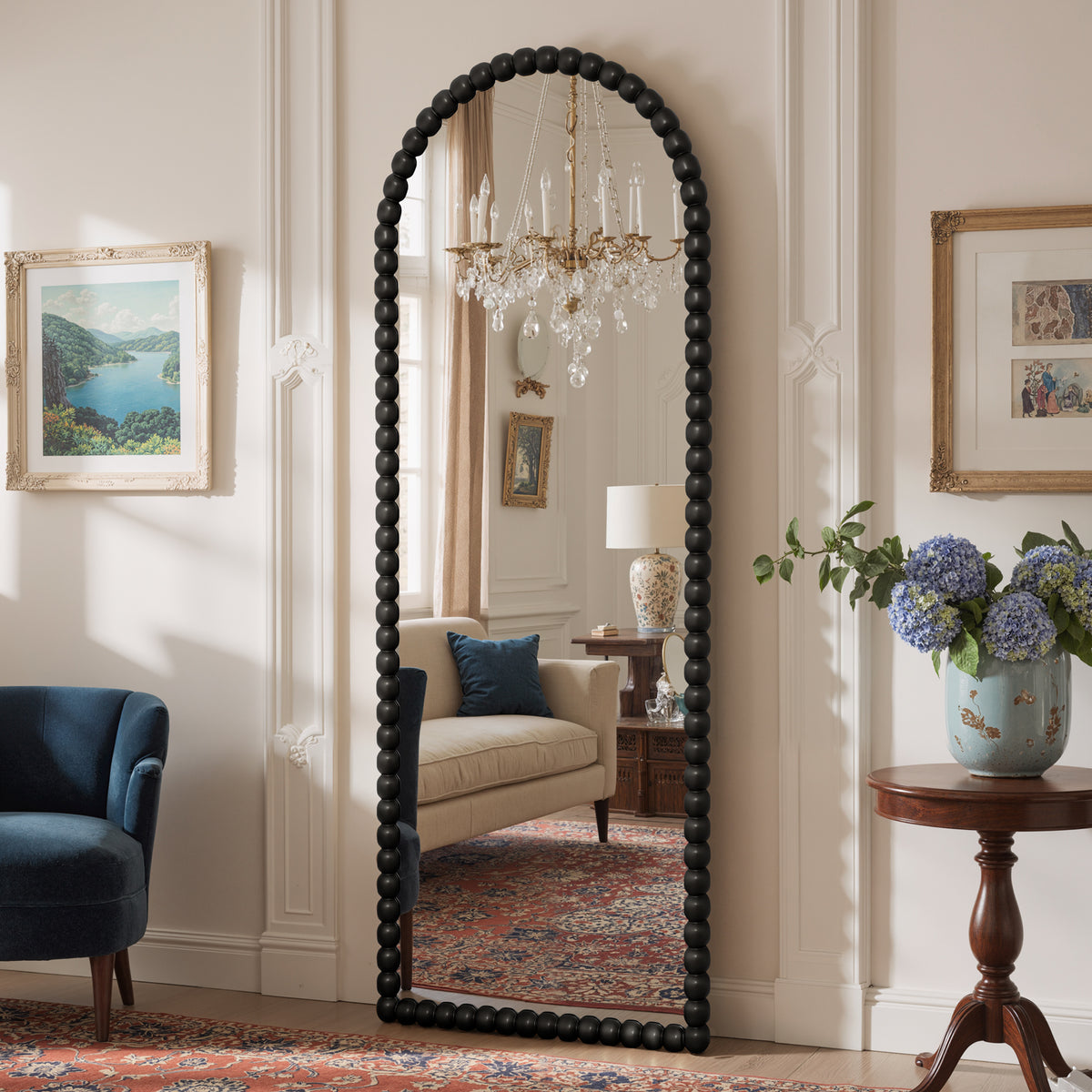 Delphine black beaded arched mirror shown at an angle