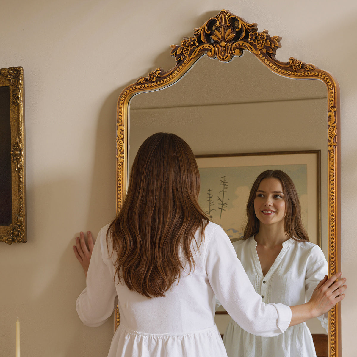Vivienne antique gold floral crest mirror shown during an outfit check