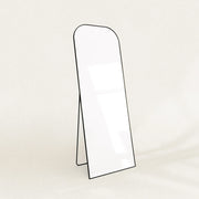 Elliot black curved full-length mirror on its folding stand