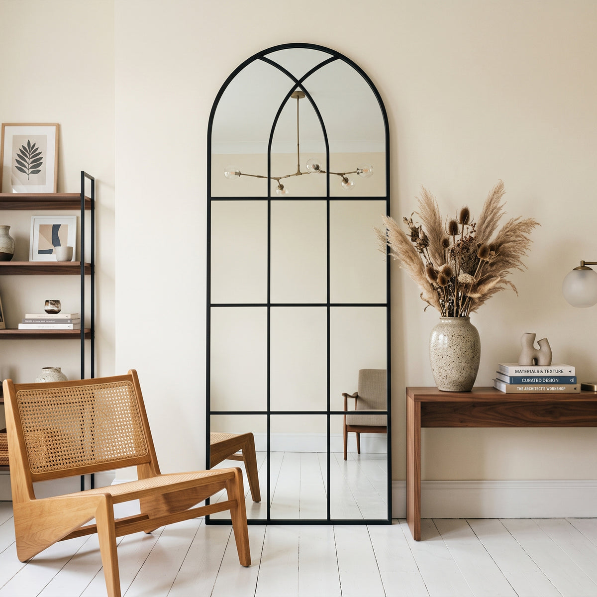 August black full-length windowpane mirror, 24W x 65H, in a furnished interior