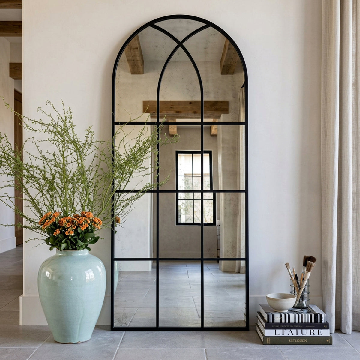 August black full-length windowpane mirror, 30W x 71H, in a furnished interior