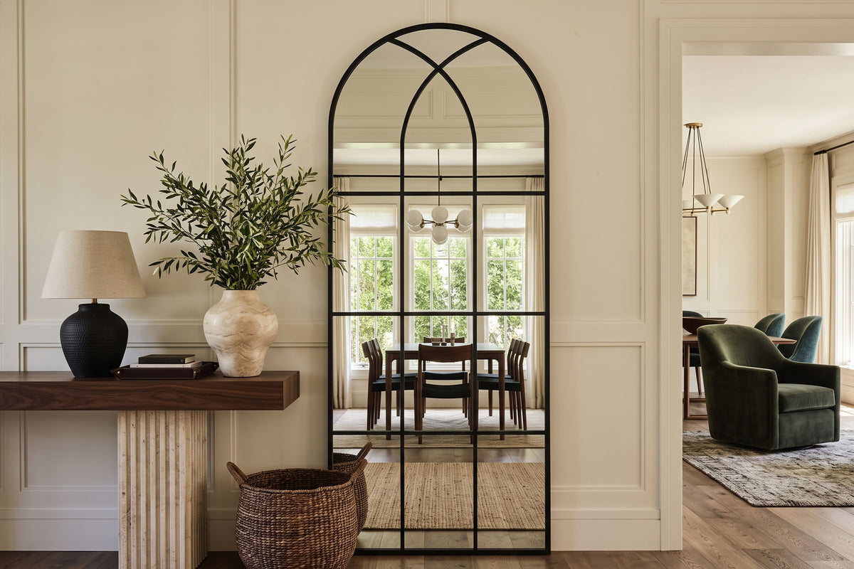 August black full-length windowpane mirror in a living room