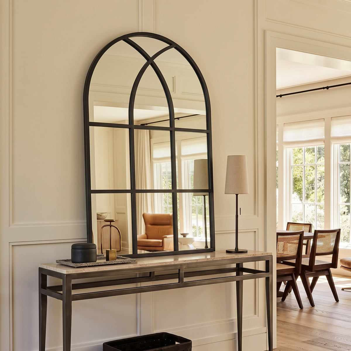 August black wall windowpane mirror, 30W x 48H, in a furnished interior, angled view