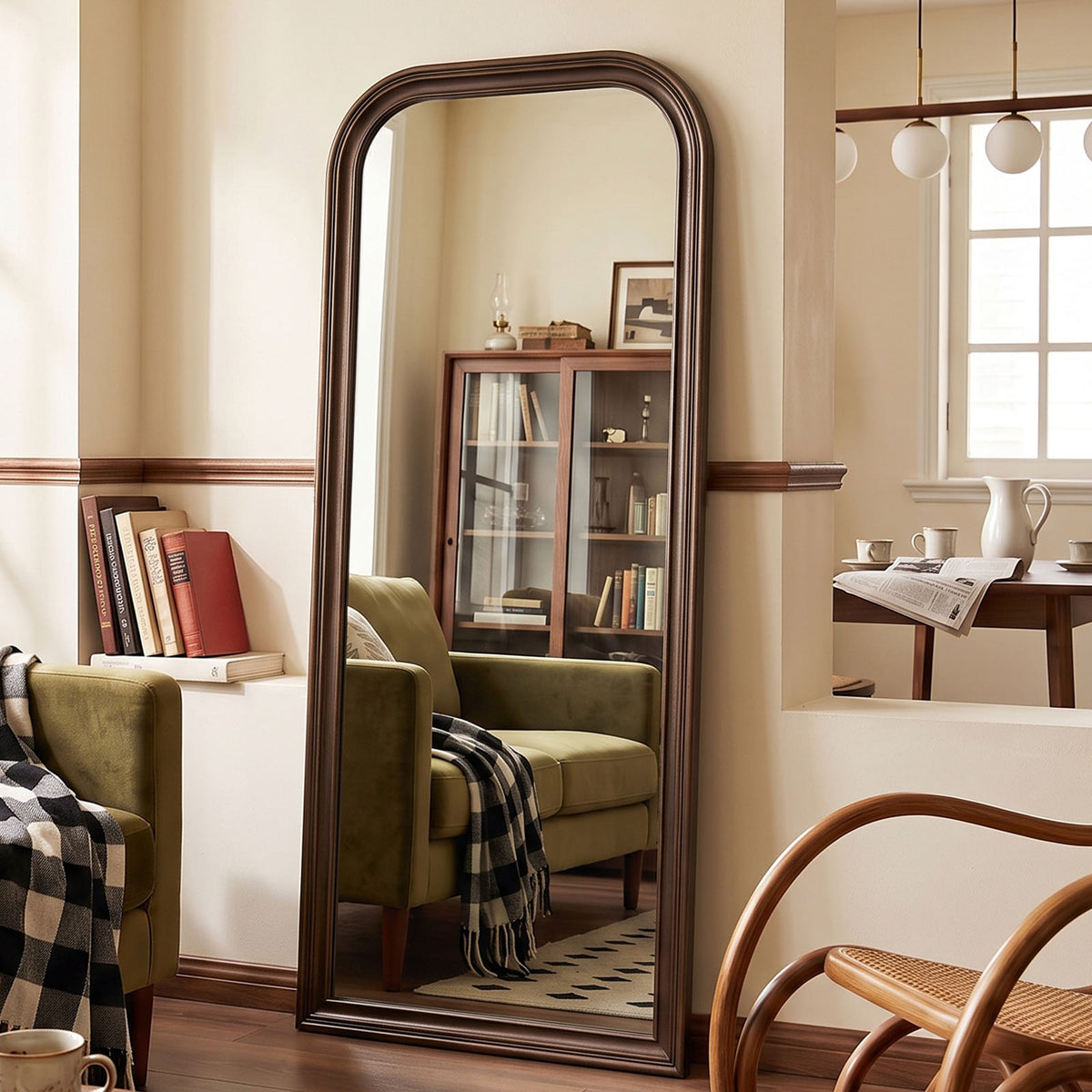 Estelle antique bronze full-length mirror in a furnished interior