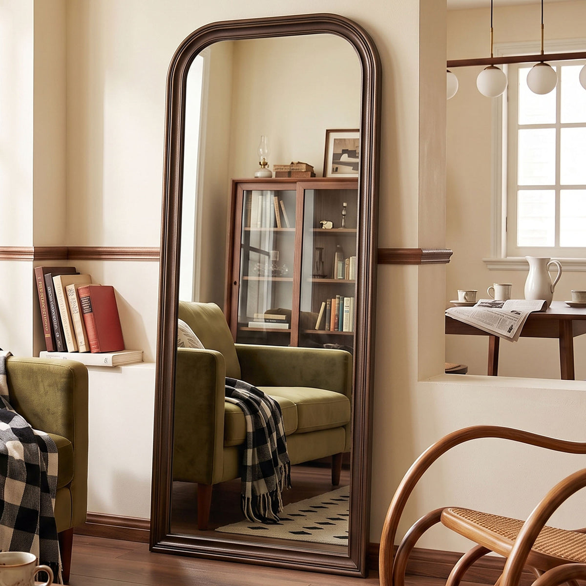 Estelle antique bronze full-length mirror in a furnished interior