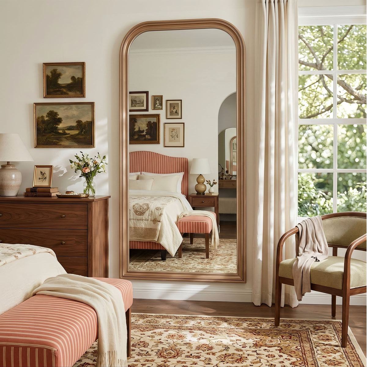 Estelle antique silver full-length mirror mounted on a bedroom wall